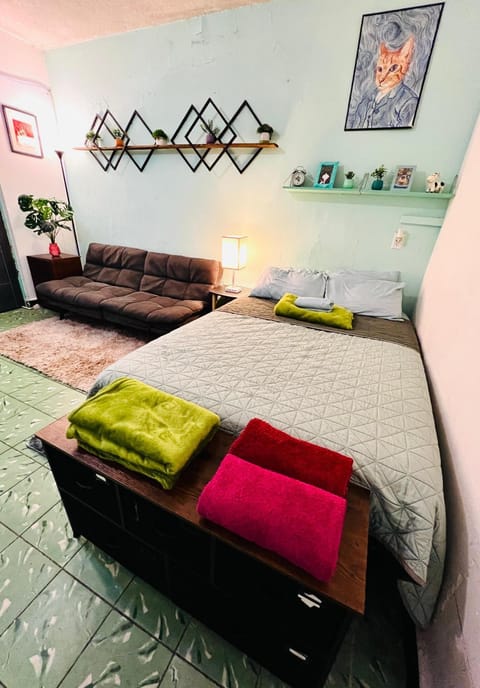 Bed, Living room, Seating area, Bedroom