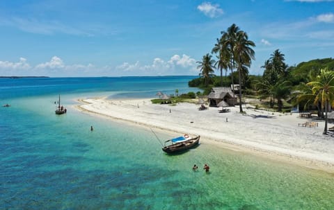 Property building, Day, Natural landscape, Beach, Sea view