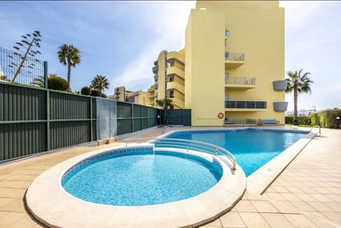 Property building, Living room, Swimming pool