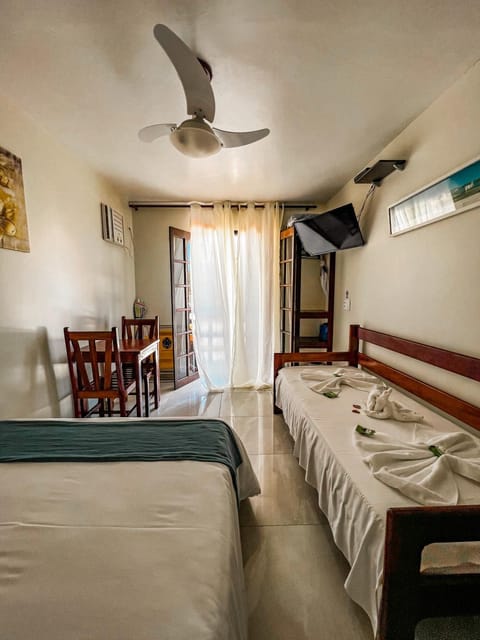 Bed, towels, air conditioner