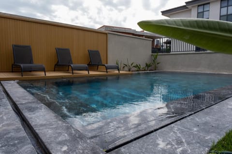 Swimming pool, sunbed