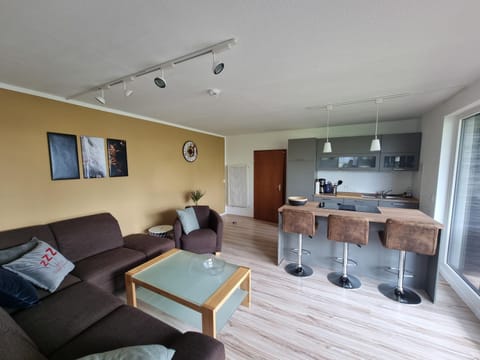 Kitchen or kitchenette, Living room, Seating area, Dining area