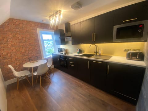 Kitchen or kitchenette, Dining area, dishwasher, oven, pet friendly, stove, toaster