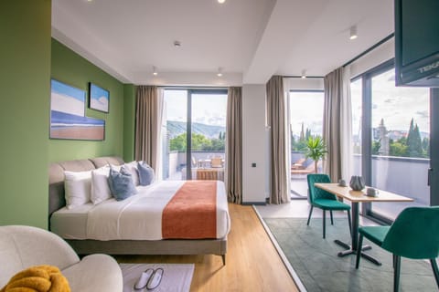 Bed, Balcony/Terrace, Living room, Seating area, Bedroom