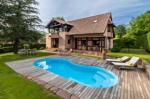 Property building, Living room, Swimming pool