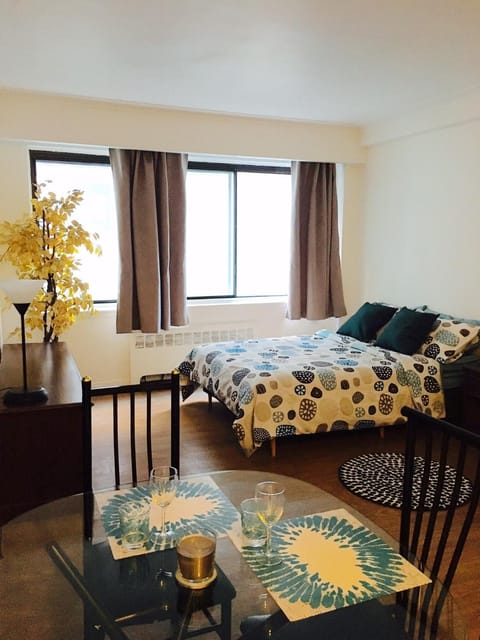 Bed, Living room, Seating area, Bedroom
