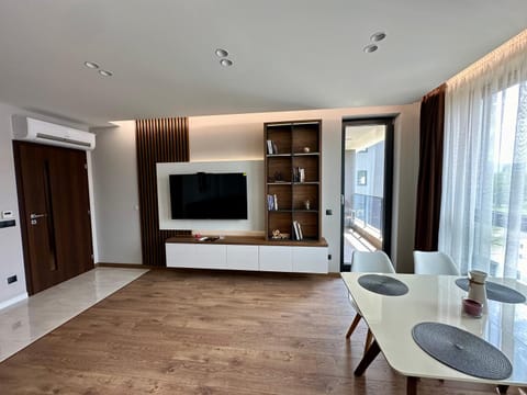 TV and multimedia, Living room, Seating area, Dining area, furniture, furniture, towels, wardrobe, air conditioner