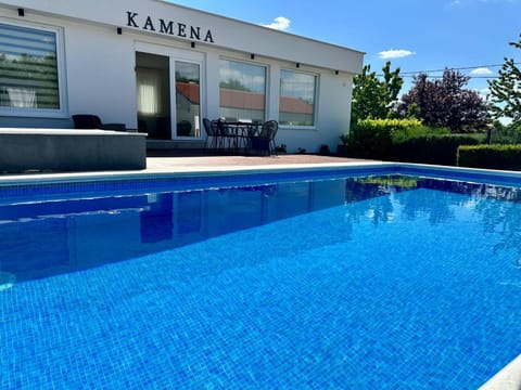 Property building, Pool view, Swimming pool, sunbed