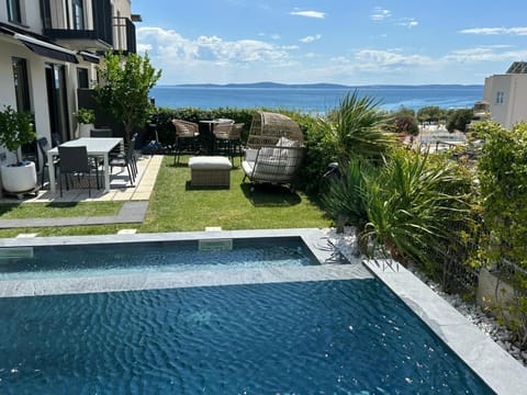 Enjoyer - Seafront apartment with PRIVATE Heated POOL and terrace Villa in Split