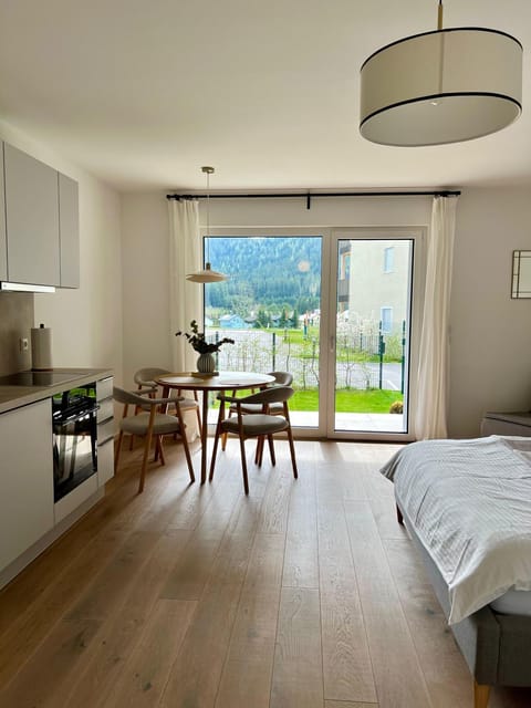 Bed, View (from property/room), Kitchen or kitchenette, Dining area, Garden view, kitchen