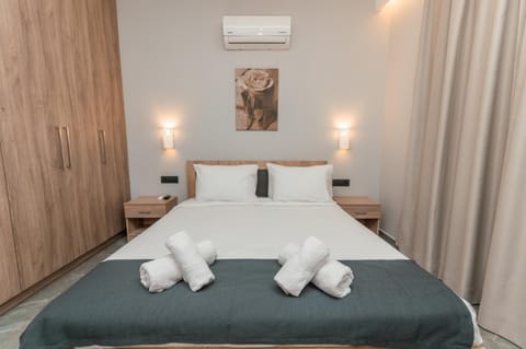 Bed, Bedroom, towels, wardrobe, air conditioner