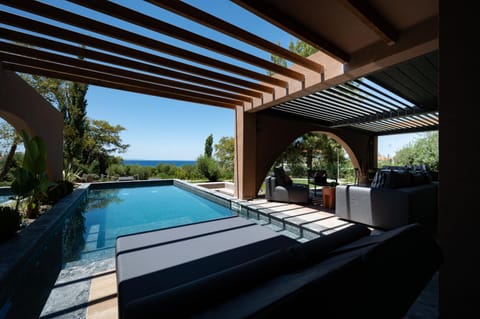 Property building, Patio, Day, Natural landscape, Garden, View (from property/room), Balcony/Terrace, Living room, Pool view, Sea view, Swimming pool, Swimming pool, Inner courtyard view, sunbed