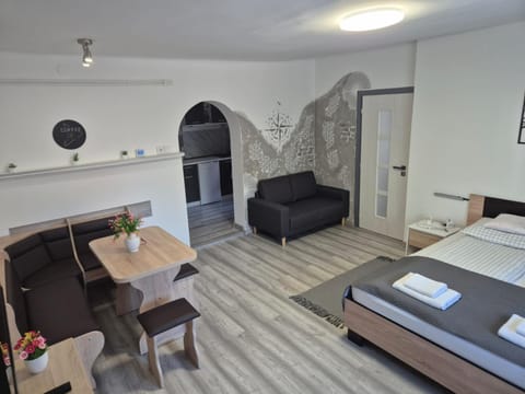 Bed, Living room, Seating area, Bedroom