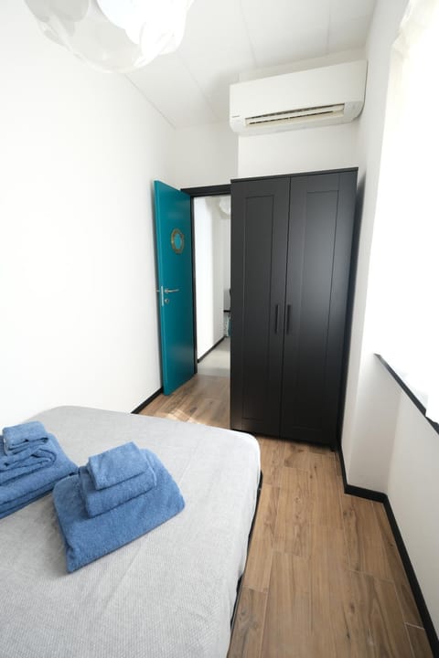 Bed, Photo of the whole room, Bedroom, towels, wardrobe, air conditioner