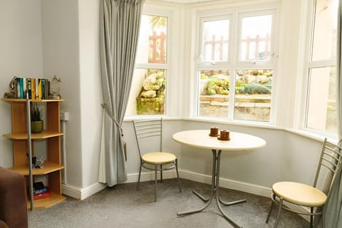 Library, Living room, Seating area, Dining area