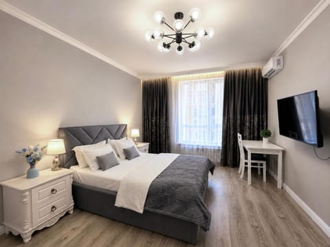 Communal lounge/ TV room, Bed, TV and multimedia, Photo of the whole room, Evening entertainment, Bedroom, air conditioner