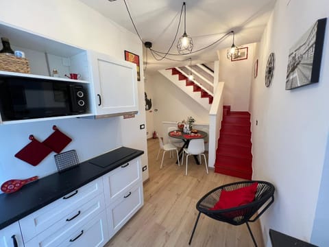 Kitchen or kitchenette, Living room, Seating area, Dining area