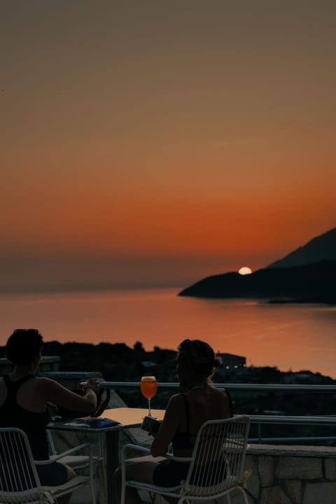 Property building, Restaurant/places to eat, People, Natural landscape, Sunset, group of guests