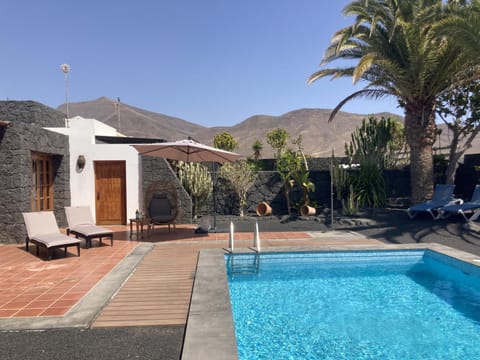 Patio, Day, Natural landscape, Mountain view, Pool view, Swimming pool, sunbed