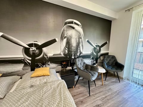 Bed, Living room, Seating area