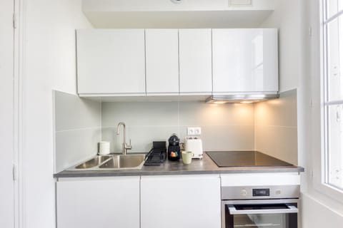 Kitchen or kitchenette, stove, toaster