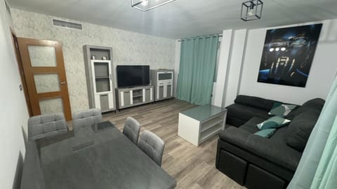 Communal lounge/ TV room, TV and multimedia, Living room, Seating area, Dining area, air conditioner
