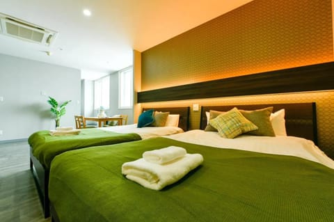 Bed, Photo of the whole room, Bedroom, towels, air conditioner