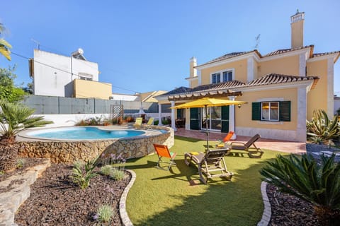 Property building, Living room, Swimming pool