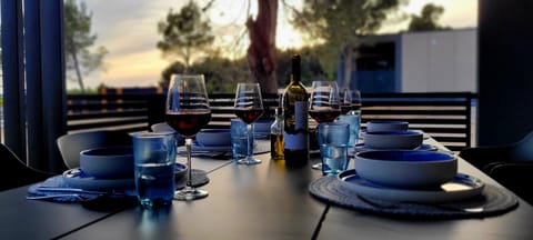 View (from property/room), Balcony/Terrace, Dining area, Sunset