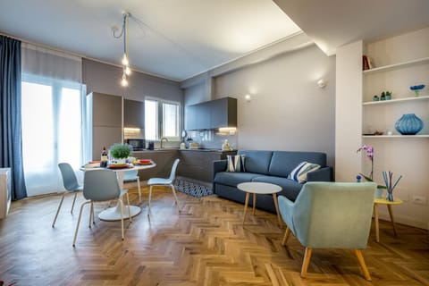 Kitchen or kitchenette, Living room, Seating area, Dining area