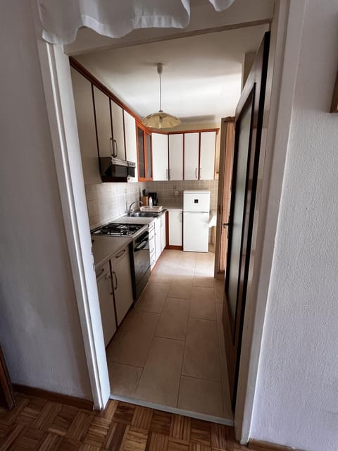 Kitchen or kitchenette, oven, stove