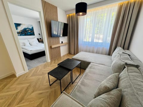 Communal lounge/ TV room, Bed, TV and multimedia, Living room, Photo of the whole room, Seating area, Evening entertainment, Bedroom