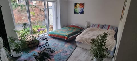 Bed, Living room, Seating area, Bedroom