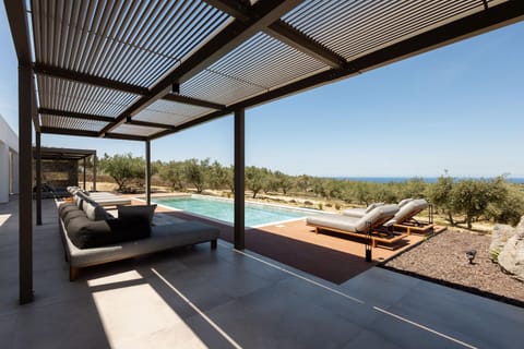 Natural landscape, Balcony/Terrace, Seating area, Sea view, Swimming pool, sunbed