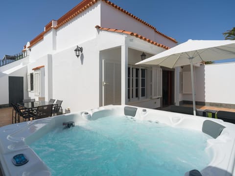 Patio, Day, Hot Tub, Pool view, sunbed