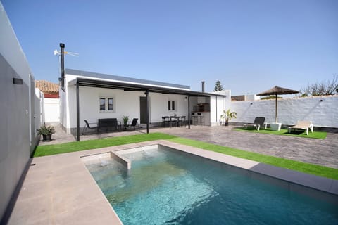 Property building, Living room, Swimming pool