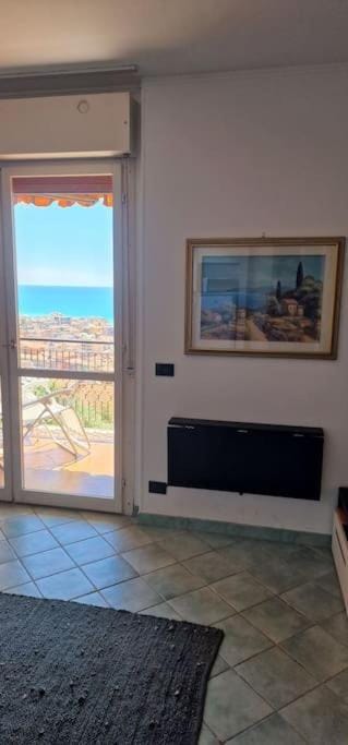 Natural landscape, View (from property/room), Balcony/Terrace, Living room, Photo of the whole room, Seating area, Bedroom, Sea view