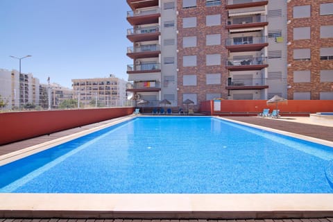 Property building, Living room, Swimming pool