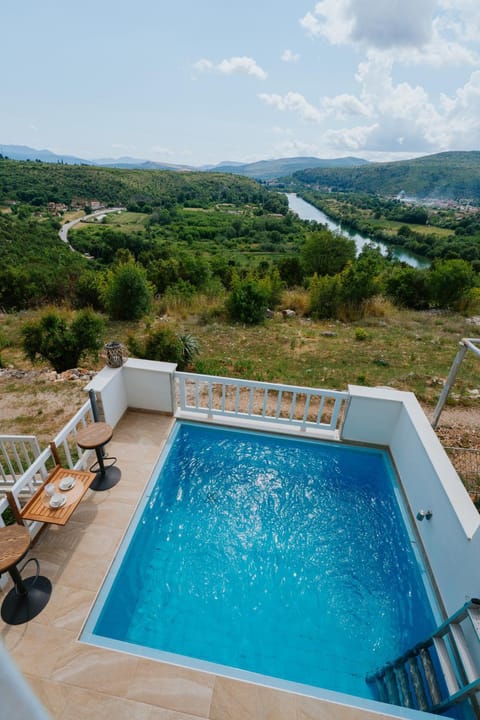 Natural landscape, Bird's eye view, Mountain view, River view, Swimming pool