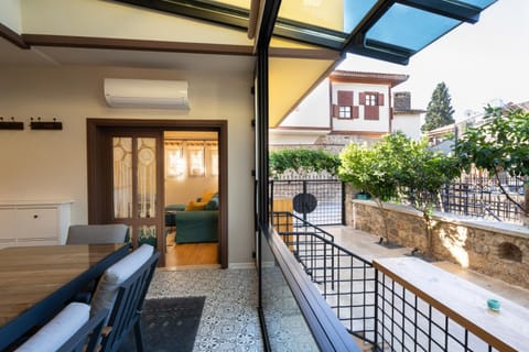 Property building, Patio, Day, View (from property/room), Balcony/Terrace, Living room, Seating area, Dining area