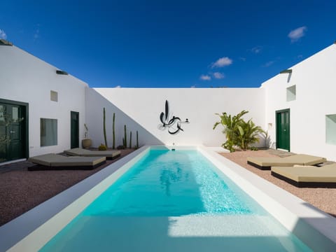 Property building, Off site, Day, Pool view, Swimming pool, sunbed