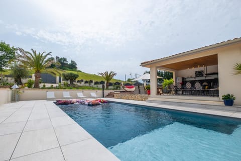 Property building, Living room, Swimming pool
