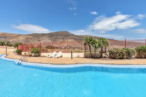 Property building, Living room, Swimming pool
