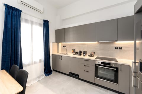 Kitchen or kitchenette, oven, stove