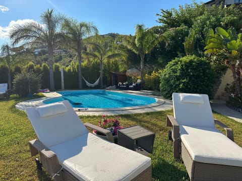 Property building, Living room, Swimming pool