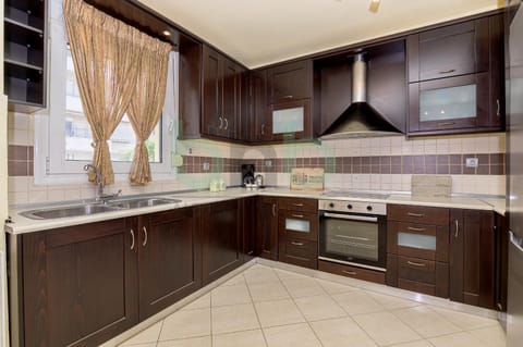 Kitchen or kitchenette, oven, stove
