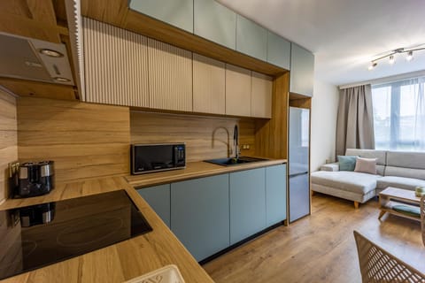 Coffee/tea facilities, Kitchen or kitchenette, Living room, Photo of the whole room, Seating area, oven, stove, toaster