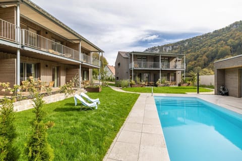 Property building, Living room, Swimming pool