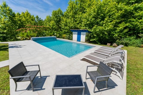 Property building, Living room, Swimming pool