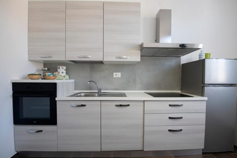 Kitchen or kitchenette, stove, kitchen